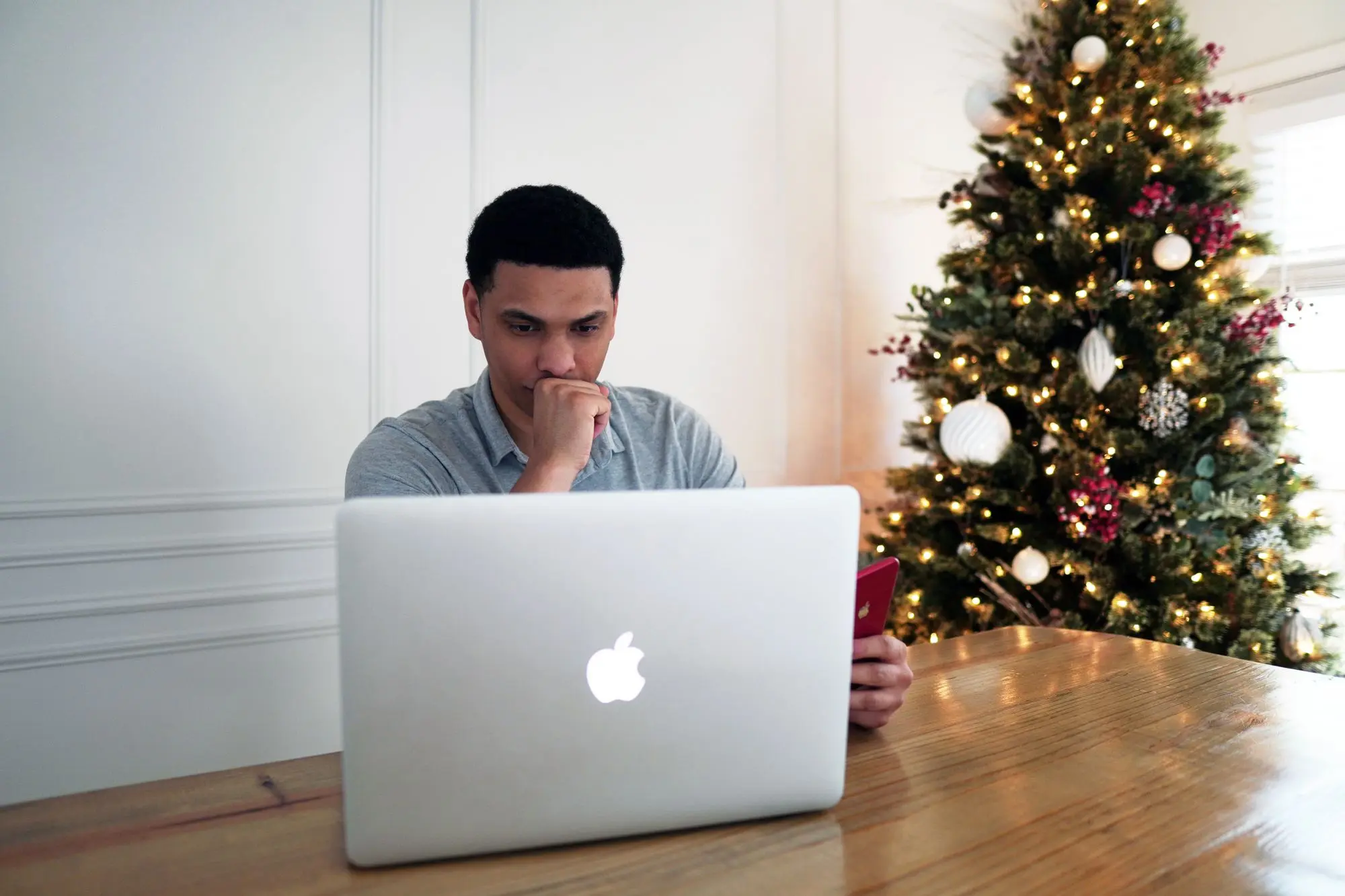 A person working remotely on his laptop