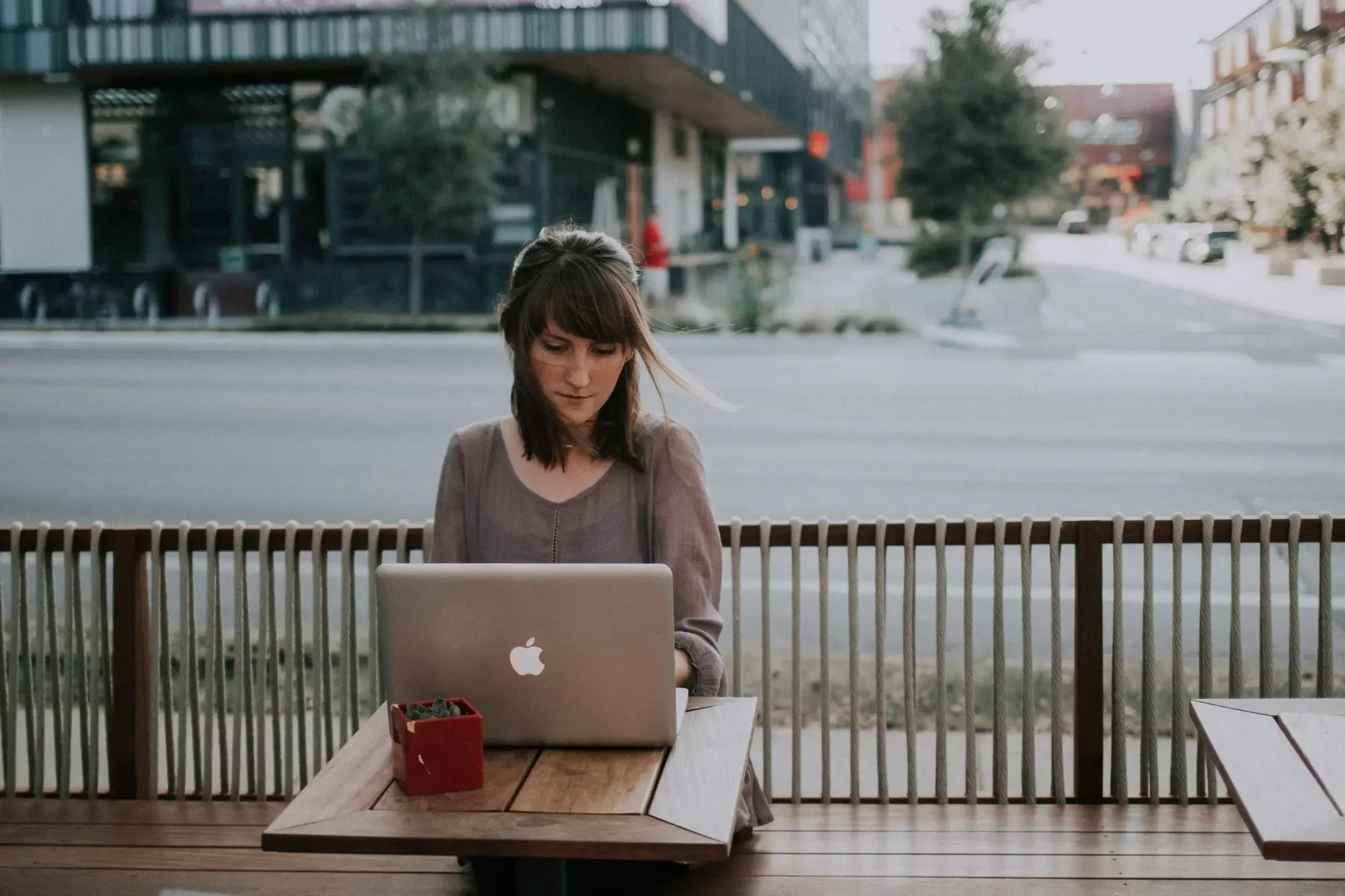 A remote employee working from a shop