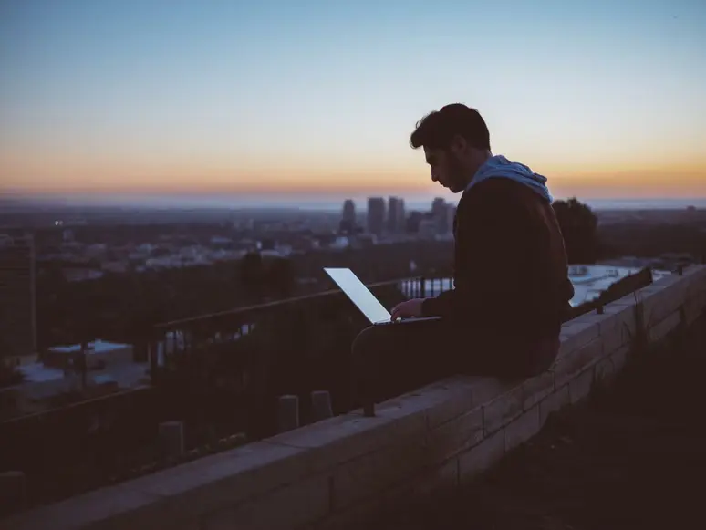 remote employee working from the rooftop