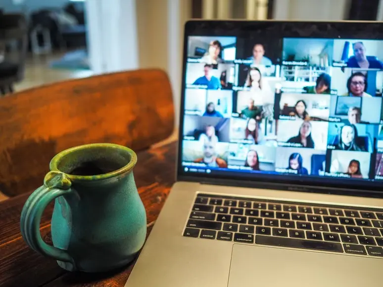 a remote meeting on laptop