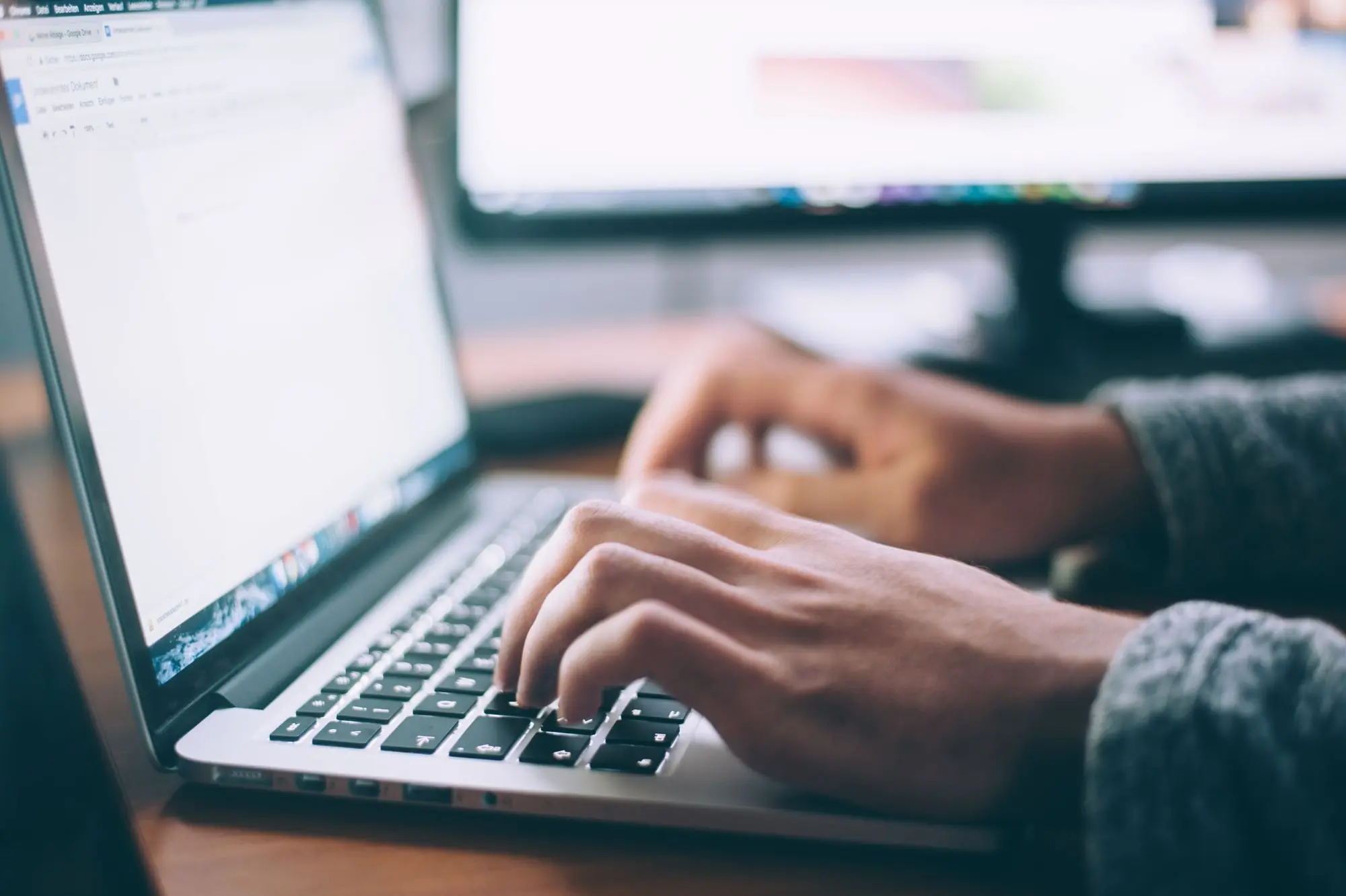 Person working remotely on a laptop