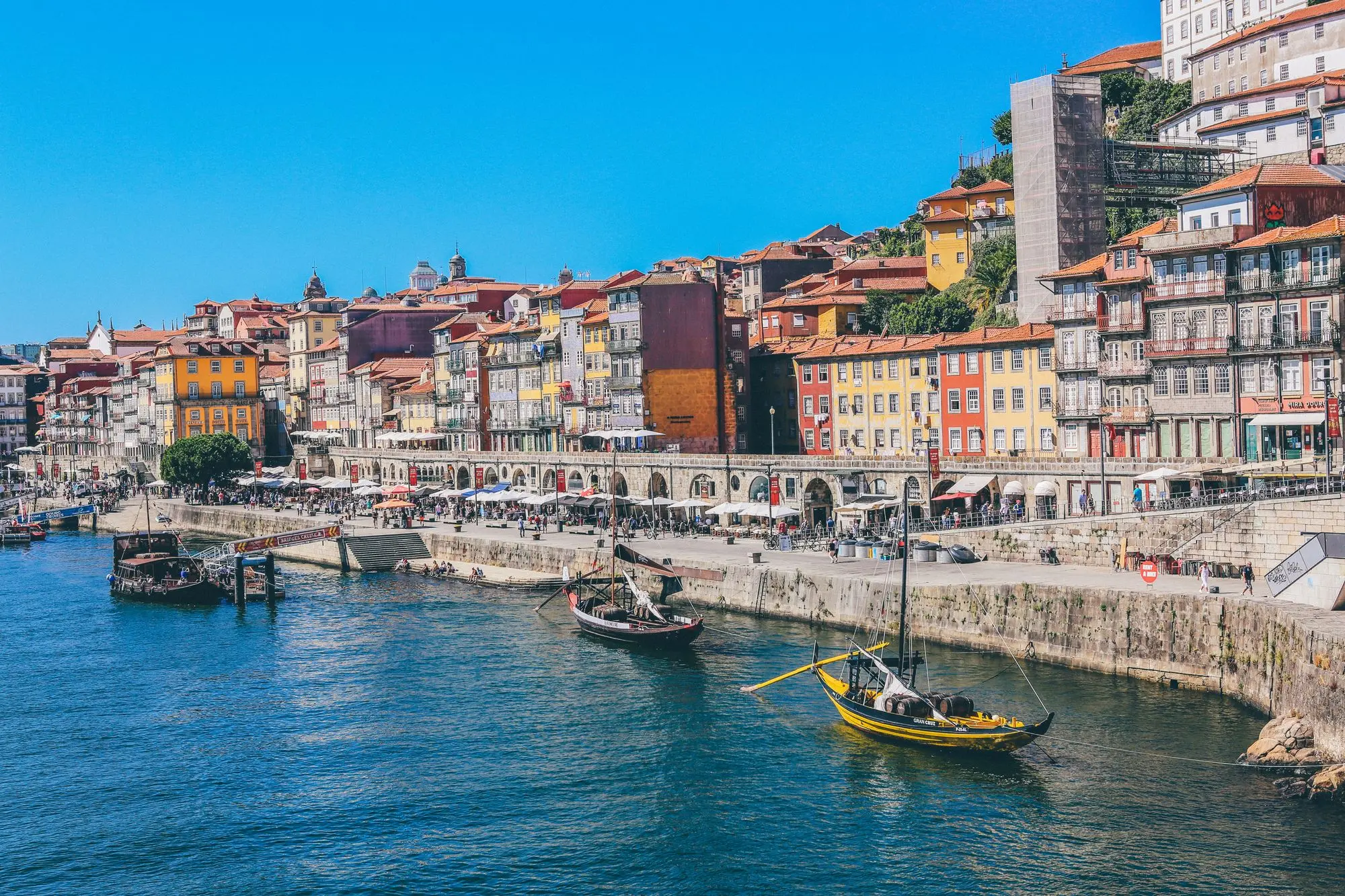 Boats docked near seaside in Porto