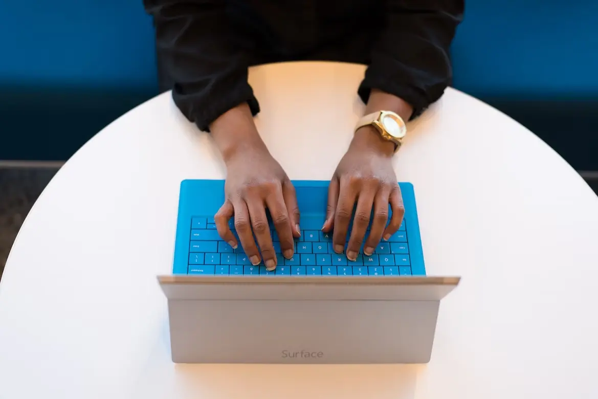 person working remotely on his laptop