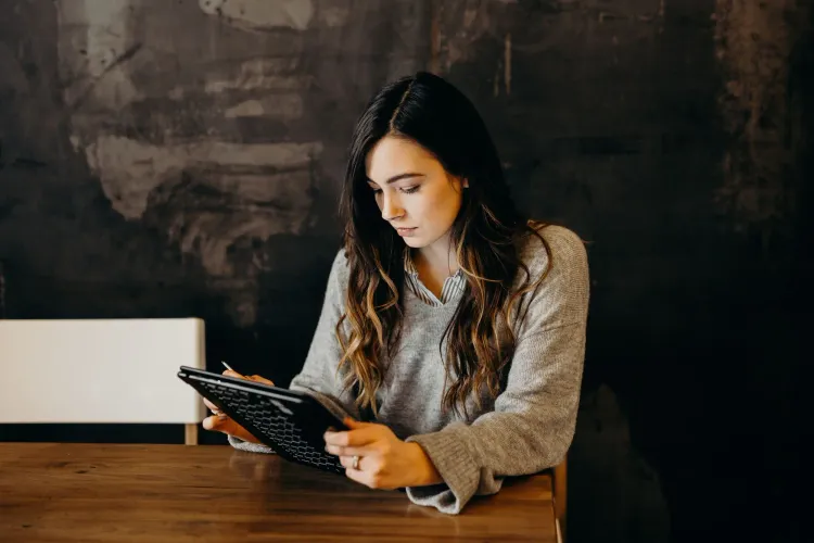 A woman using a tablet